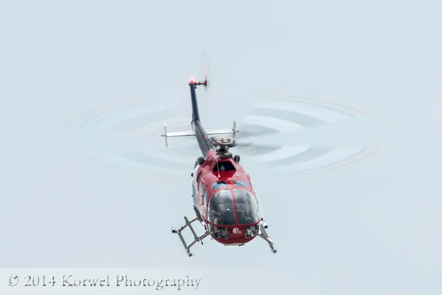 Chuck Aaron in Red Bull  helicopter. Airventure 2014