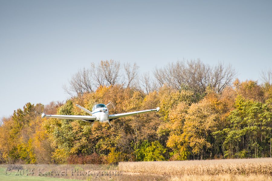 Bonanza taking off Green Castle airfield, Oxford, Iowa