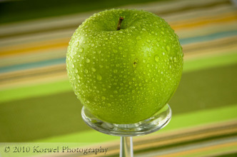 Apple on wine glass