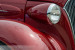 Sky in polished red vintage car